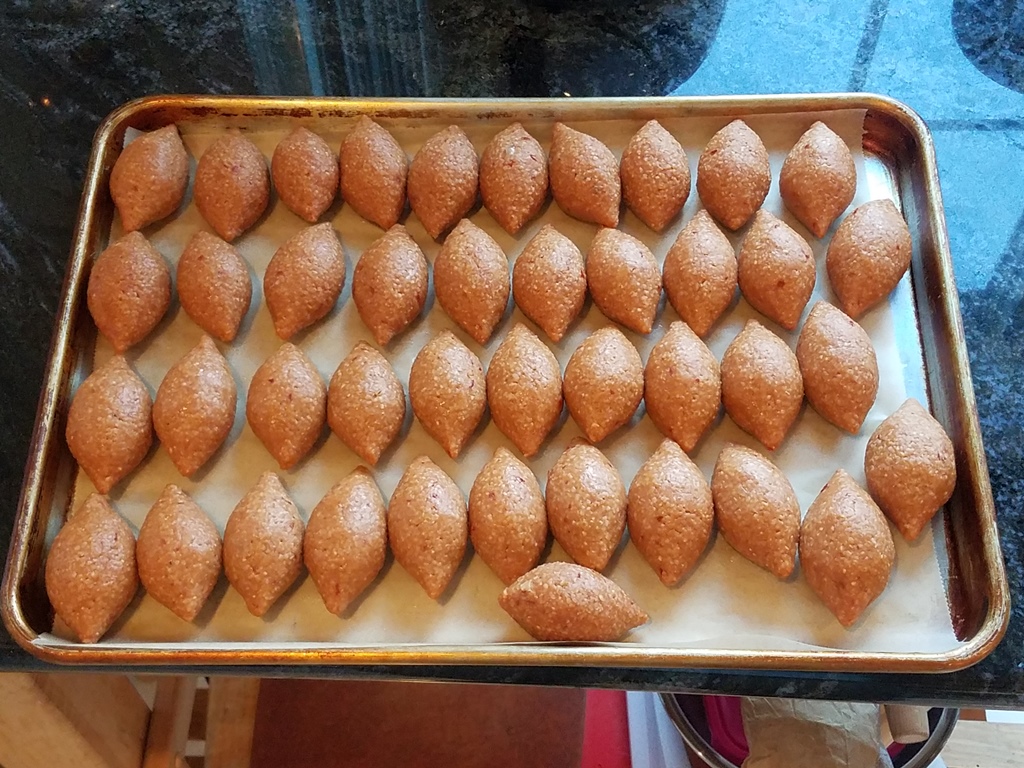 kaloor pan emerging from oven